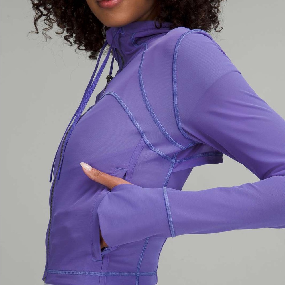 Never worn Lululemon Nulu and Mesh Cropped Define Jacket size 4.  Charged indigo